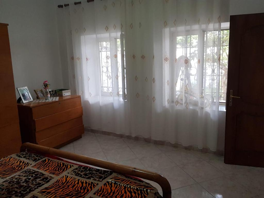 Postel nebo postele na pokoji v ubytování Kakuli Home