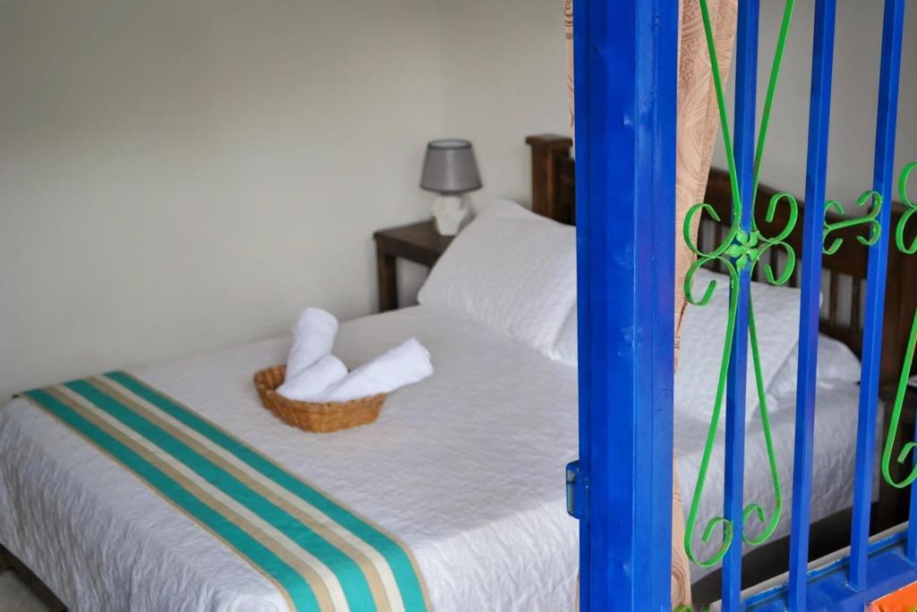 Cama o camas de una habitación en Hospedaje Mirador La Aurora Filandia