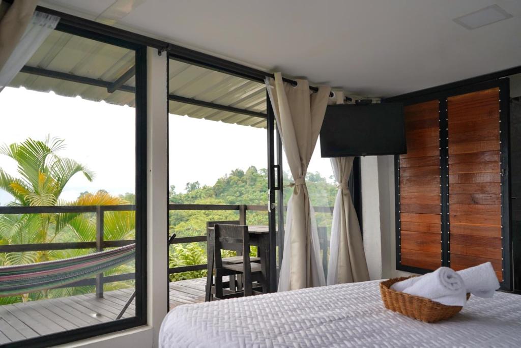Cama o camas de una habitación en Hospedaje Mirador La Aurora Filandia