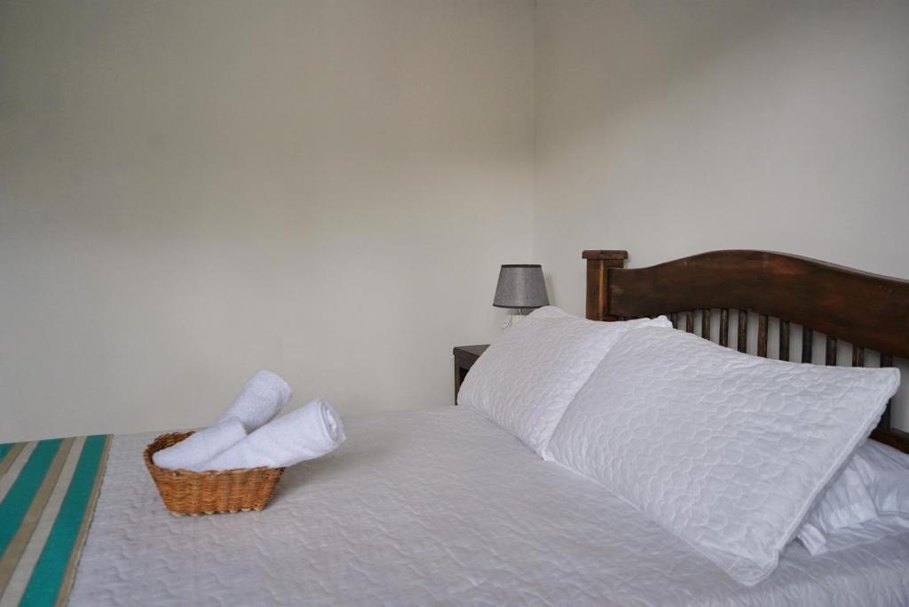 Cama o camas de una habitación en Hospedaje Mirador La Aurora Filandia