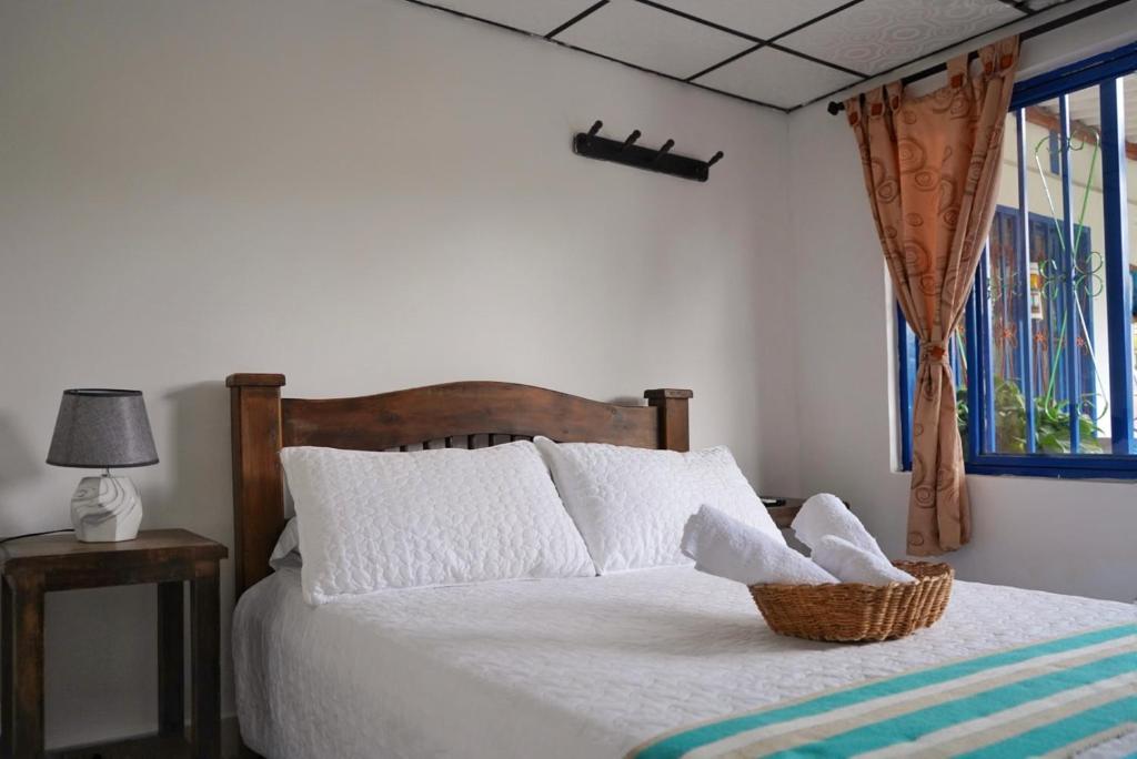 Cama o camas de una habitación en Hospedaje Mirador La Aurora Filandia