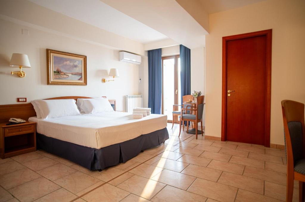 Postel nebo postele na pokoji v ubytování Hotel Bisanzio Resort
