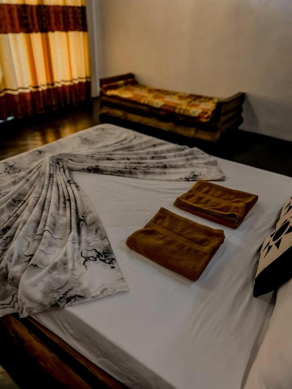 Postel nebo postele na pokoji v ubytování Dune Delight Villa