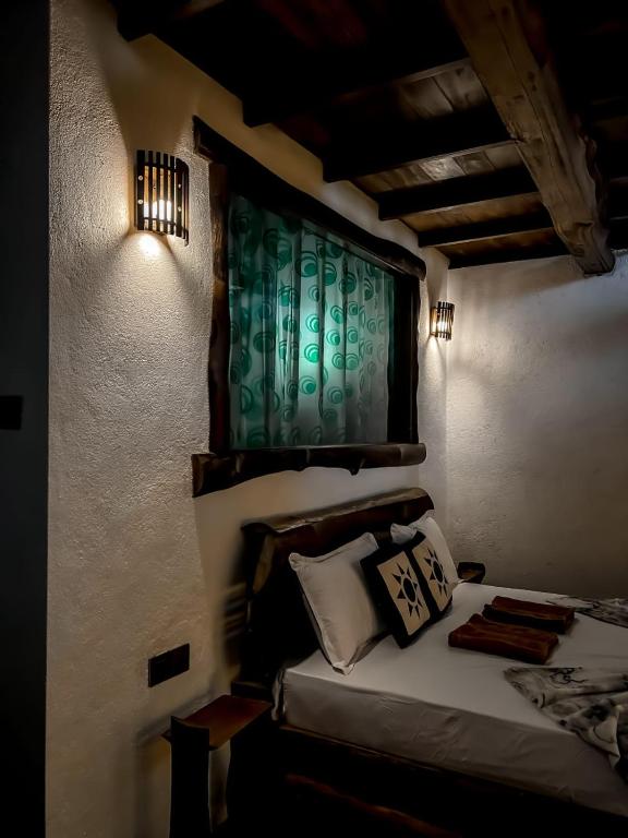 Postel nebo postele na pokoji v ubytování Dune Delight Villa