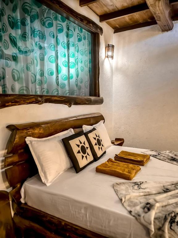 Postel nebo postele na pokoji v ubytování Dune Delight Villa