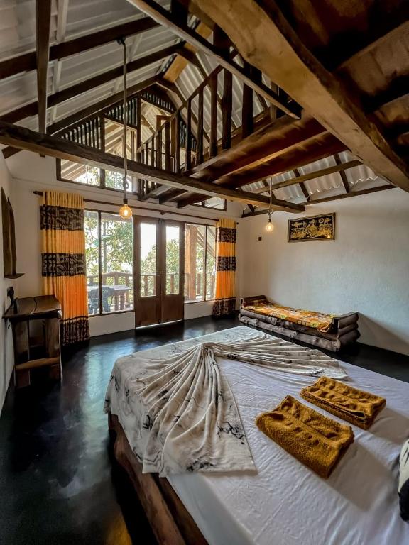 Postel nebo postele na pokoji v ubytování Dune Delight Villa