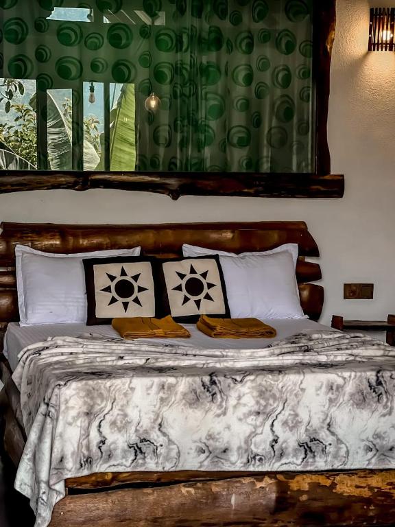 Postel nebo postele na pokoji v ubytování Dune Delight Villa