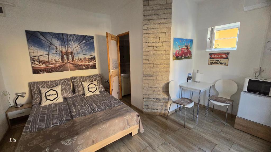 Postel nebo postele na pokoji v ubytování MP Center Magánszállás