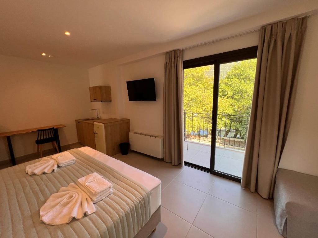 Postel nebo postele na pokoji v ubytování Likno Hotel