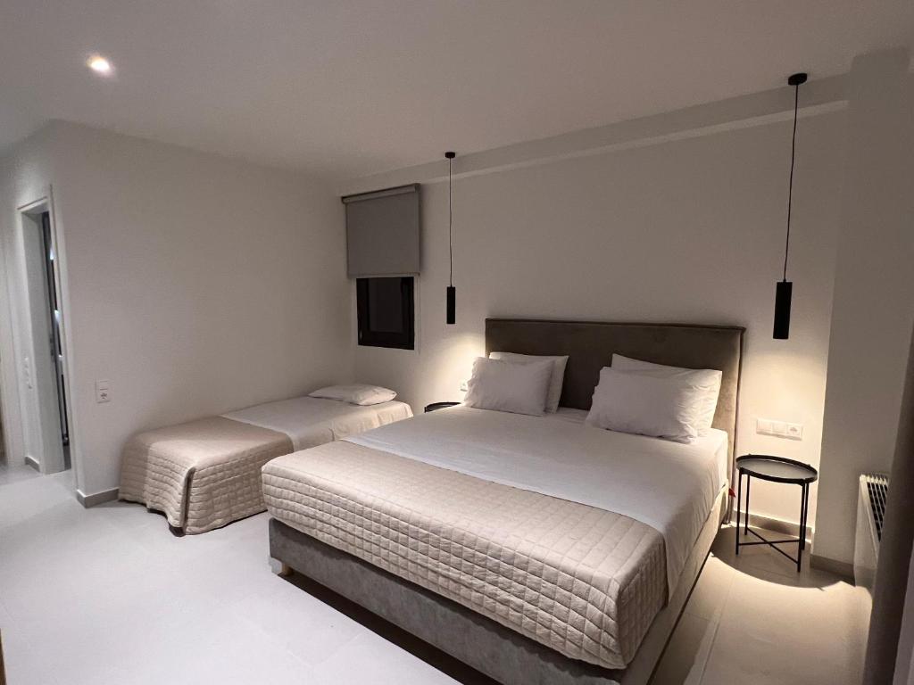 Postel nebo postele na pokoji v ubytování Likno Hotel