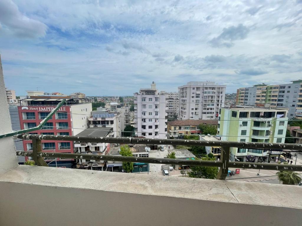a view of a city from a balcony at Good Apartment in Barç