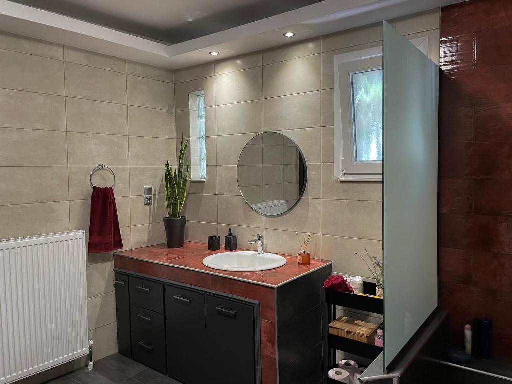 Koupelna v ubytování Aristides Guesthouse