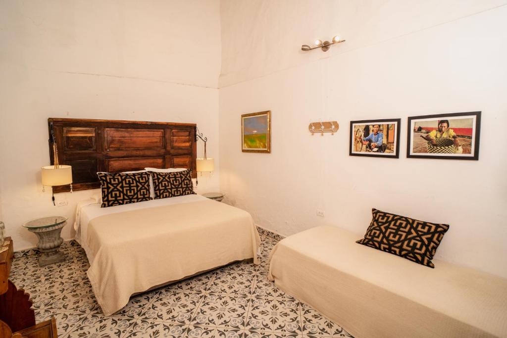 Postel nebo postele na pokoji v ubytování Casa Al Alma