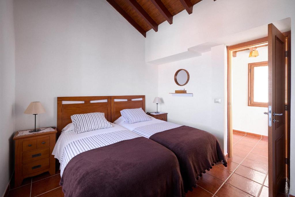Posteľ alebo postele v izbe v ubytovaní Casa Rural Los Perales