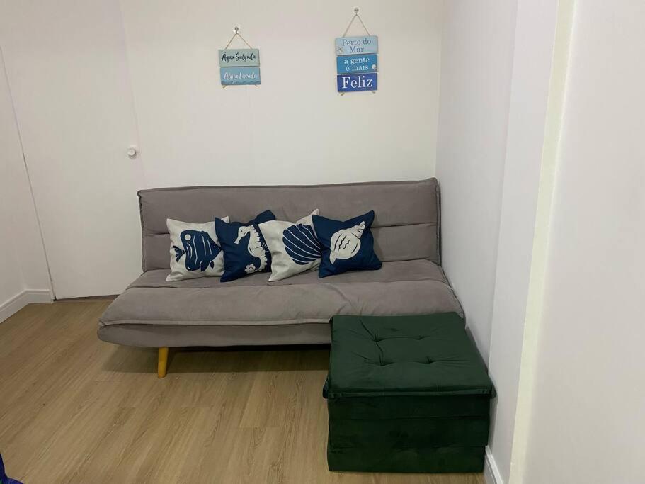 Гостиная зона в Seu apartamento na Praia