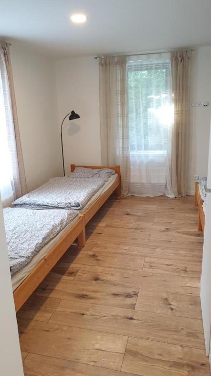 Postel nebo postele na pokoji v ubytování Tkalcovna U Zlatého potoka