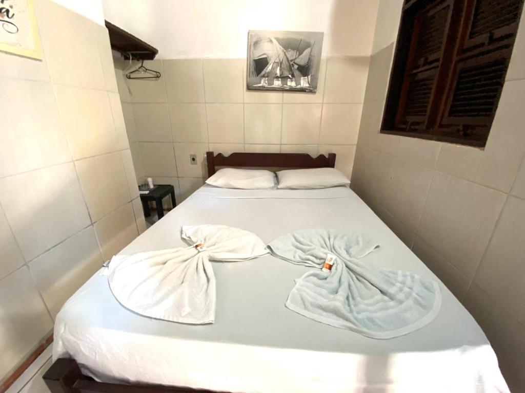 Postel nebo postele na pokoji v ubytování Pousada Tropicalia