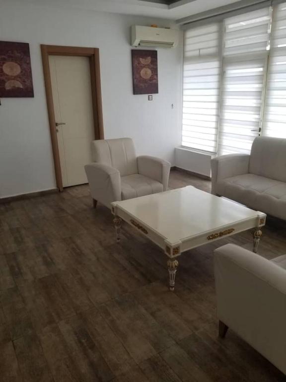 Posezení v ubytování Ellyxville Hotel