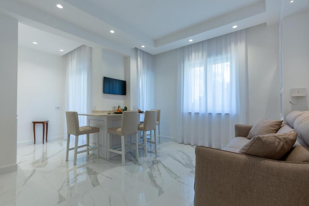 TV a/nebo společenská místnost v ubytování Maison Adriana