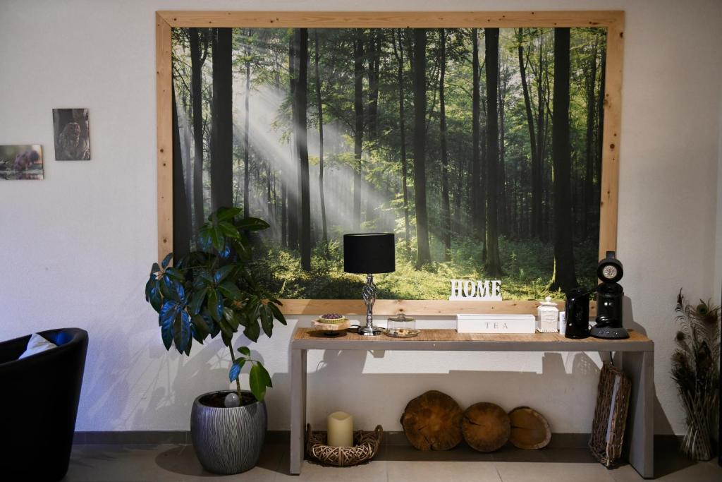 TV a/nebo společenská místnost v ubytování Kom tot rust in The Forest