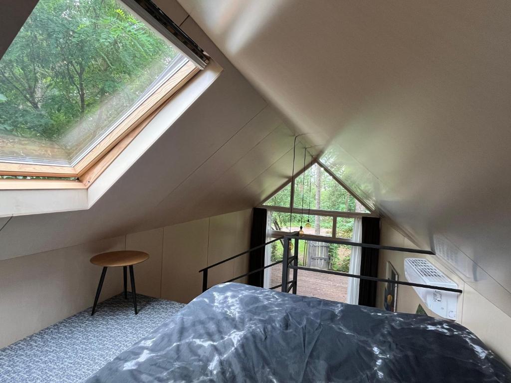 Postel nebo postele na pokoji v ubytování Sea dune cottage Kalnu