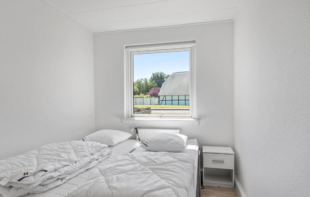 Postel nebo postele na pokoji v ubytování 2 Bedroom Nice Home In Rødby