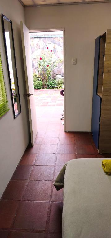 Postel nebo postele na pokoji v ubytování Casa en Bogotá ubicada en zona central