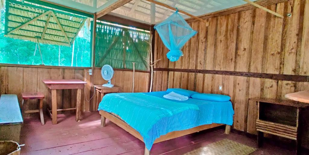 Postel nebo postele na pokoji v ubytování Amazonas Life Camp