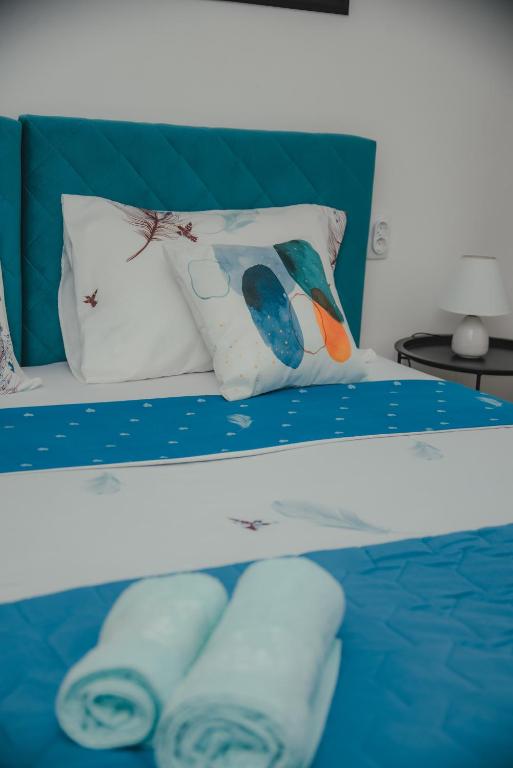 Postel nebo postele na pokoji v ubytování Jes Apartments
