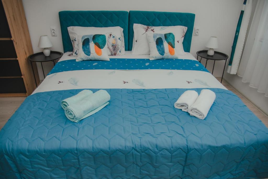 Postel nebo postele na pokoji v ubytování Jes Apartments