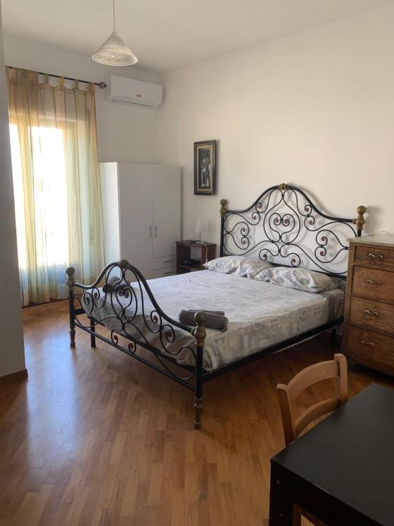 Postel nebo postele na pokoji v ubytování Casa Alighieri