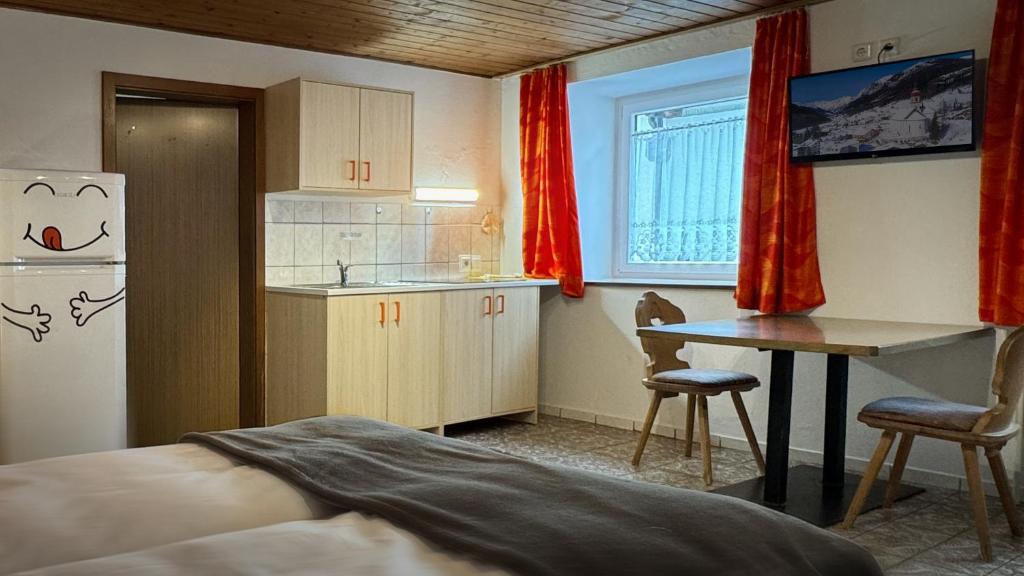 Kuchyň nebo kuchyňský kout v ubytování Residence Barbara