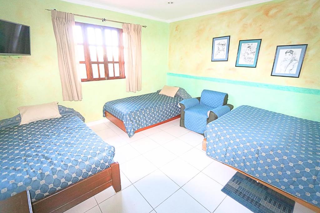 Voodi või voodid majutusasutuse Aparthotel Los Pinos toas