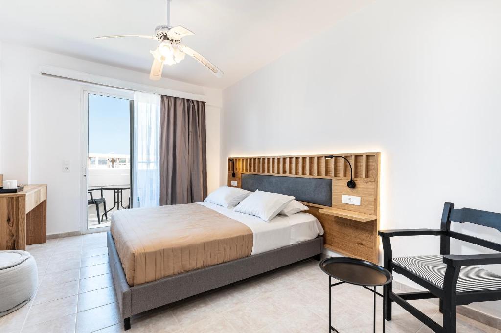 Postel nebo postele na pokoji v ubytování Aegean Bay Hotel