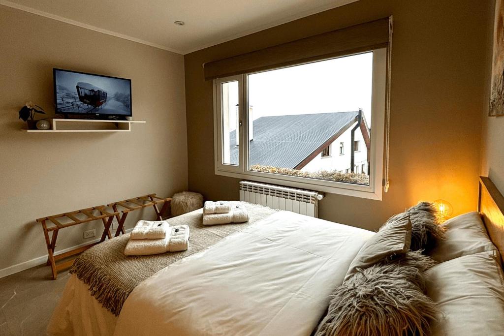 Postel nebo postele na pokoji v ubytování Departamento completo en San Carlos de Bariloche, Argentina