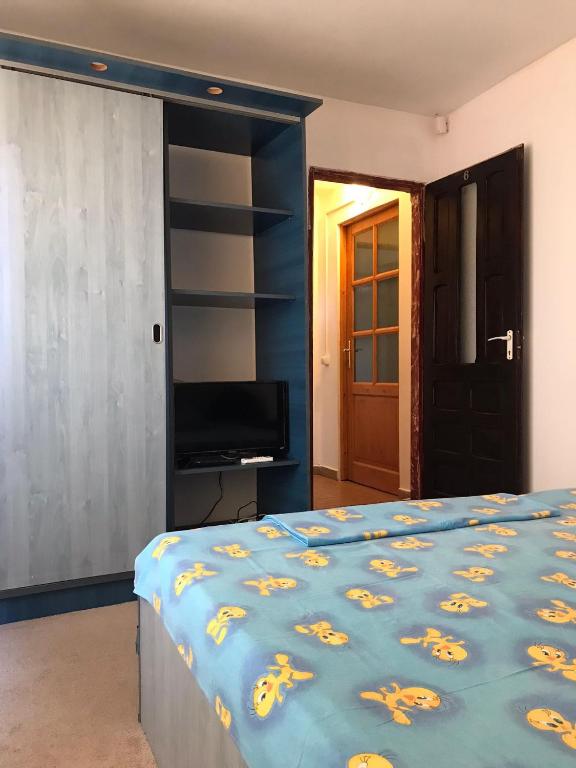 Postel nebo postele na pokoji v ubytování Vila ALBA AREAL