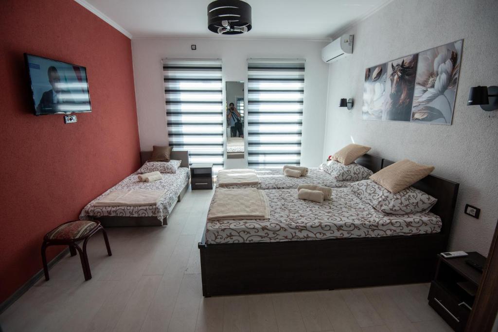 Postel nebo postele na pokoji v ubytování Apartmani DB na Limu, Prijepolje