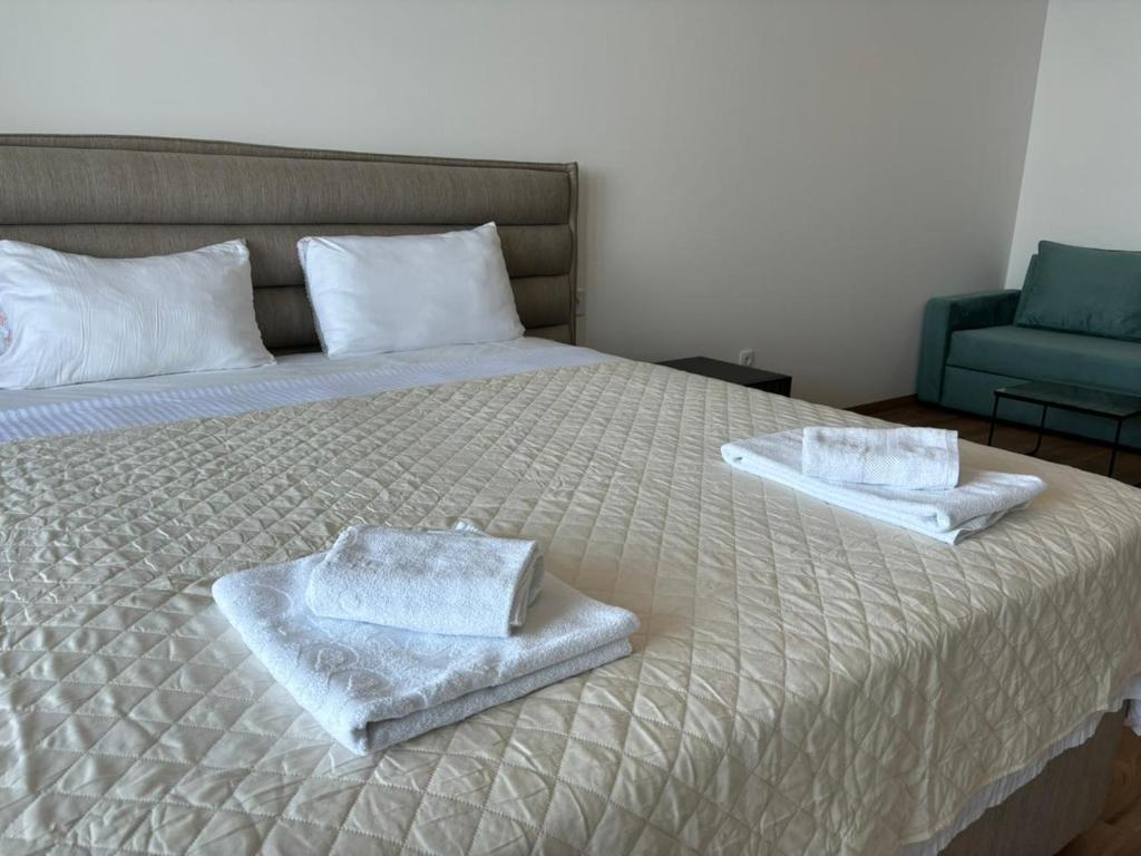 Rúm í herbergi á Hotel Sutomore