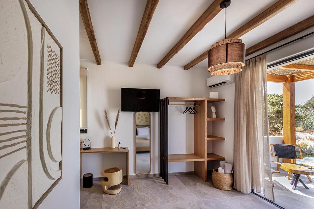 TV a/nebo společenská místnost v ubytování Obsidian Suites Milos