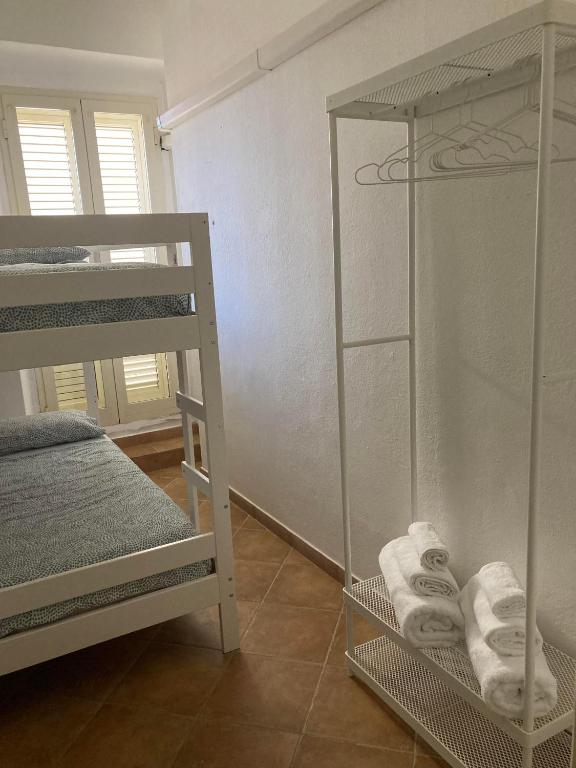 Postel nebo postele na pokoji v ubytování Casa Marisella