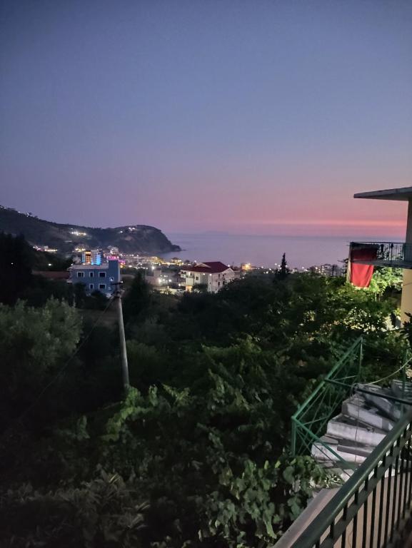 a view of the ocean at night at Relaxhouse in Himare