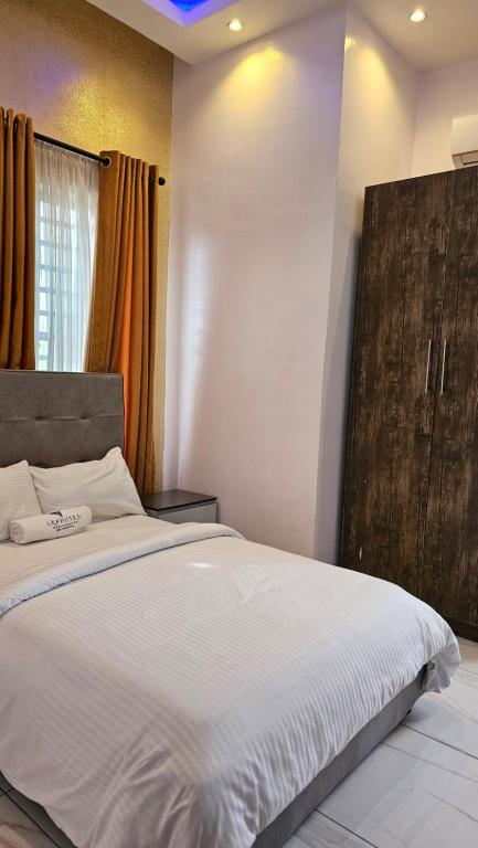 Postel nebo postele na pokoji v ubytování Sapphire Residences by Crystal