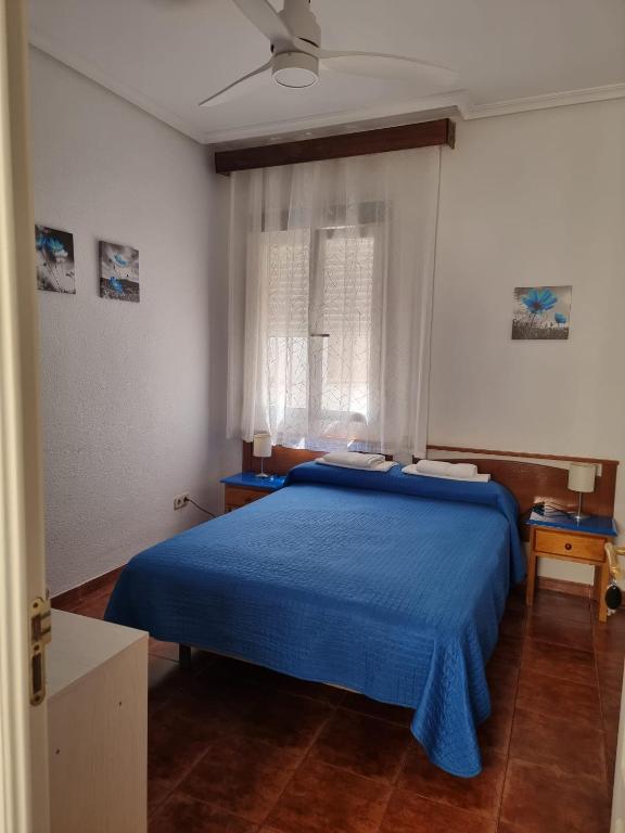 Cama o camas de una habitación en Casa de Huéspedes Cuenca