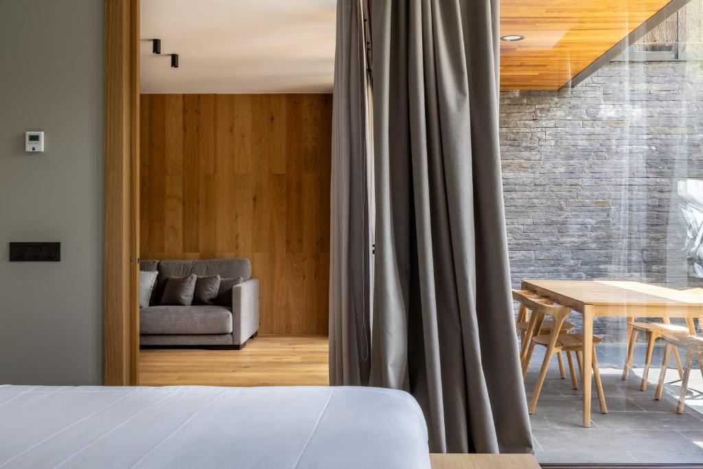 Posezení v ubytování Un diamante de montaña l A Pie De Pistas De Esquí - Gimnasio - Sauna - Piscina l 8Pax l by BonesVacances