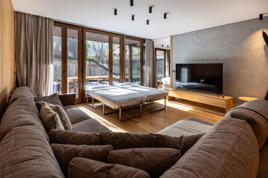 Posezení v ubytování Un diamante de montaña l A Pie De Pistas De Esquí - Gimnasio - Sauna - Piscina l 8Pax l by BonesVacances