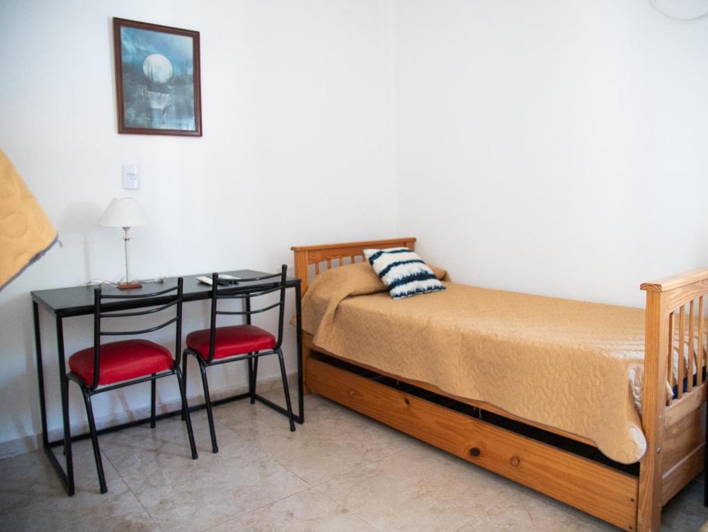 Postel nebo postele na pokoji v ubytování GOa Hospedajes
