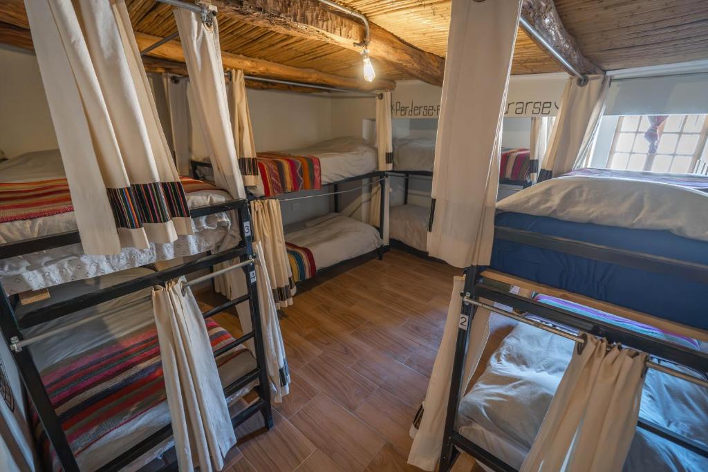 Postel nebo postele na pokoji v ubytování Puna Hostel