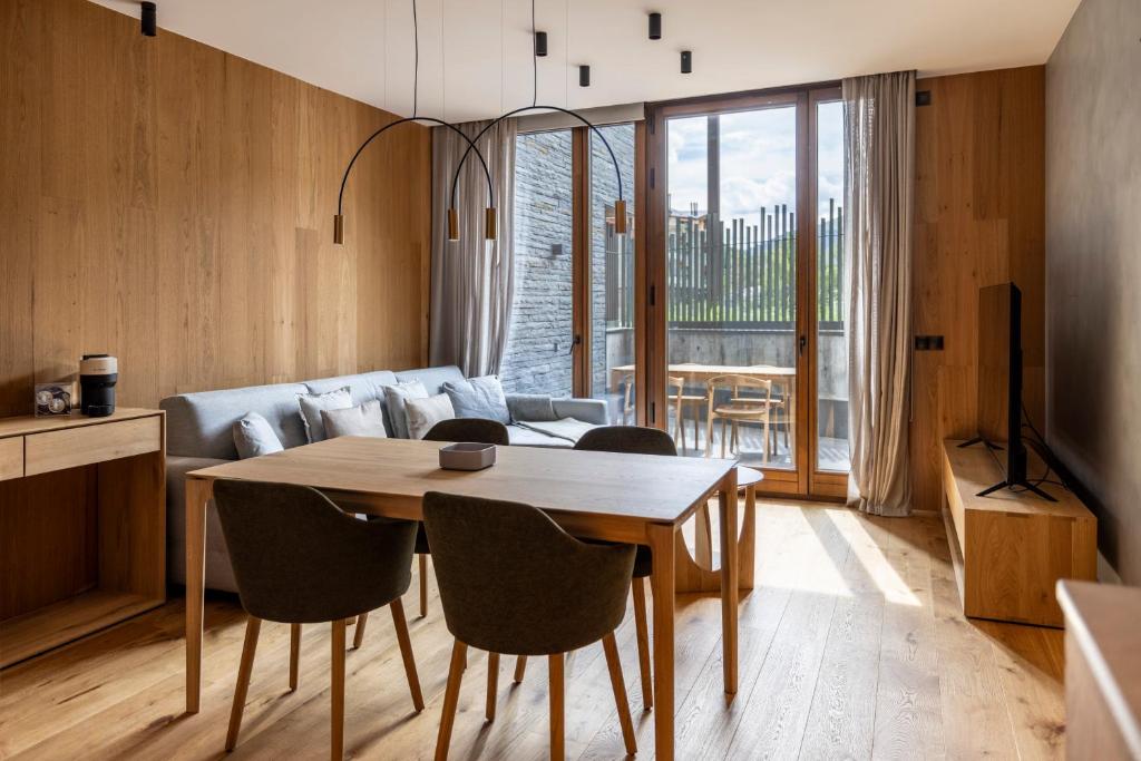 Posezení v ubytování Un diamante de montaña l A Pie De Pistas De Esquí - Gimnasio - Sauna - Piscina l 6Pax l by BonesVacances