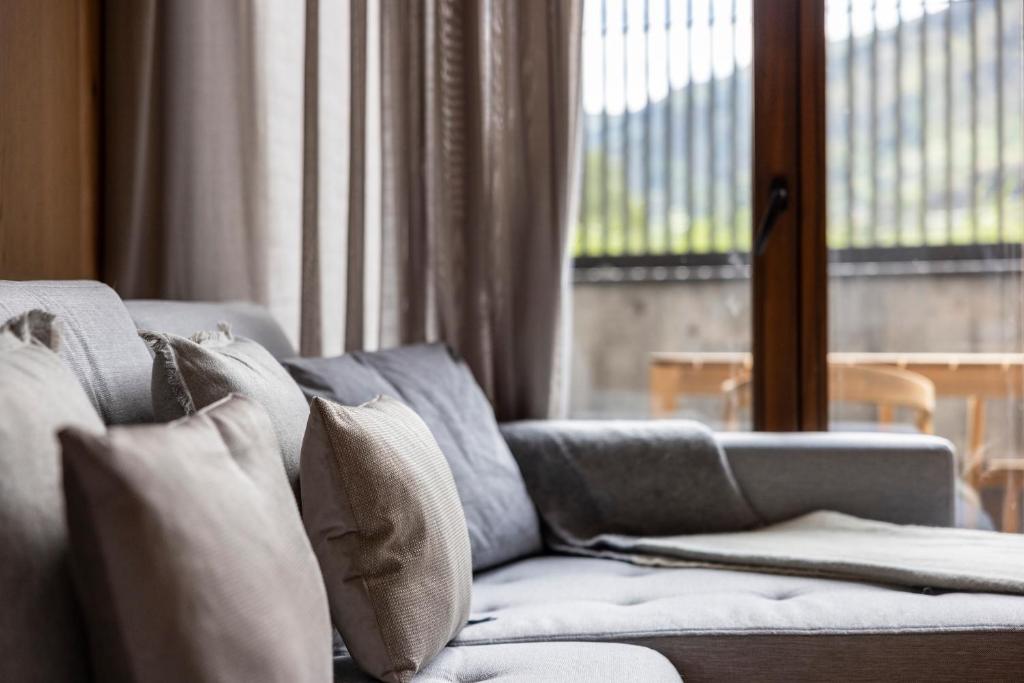 Posezení v ubytování Un diamante de montaña l A Pie De Pistas De Esquí - Gimnasio - Sauna - Piscina l 6Pax l by BonesVacances