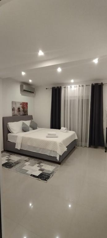 Postel nebo postele na pokoji v ubytování Kahari Apartments
